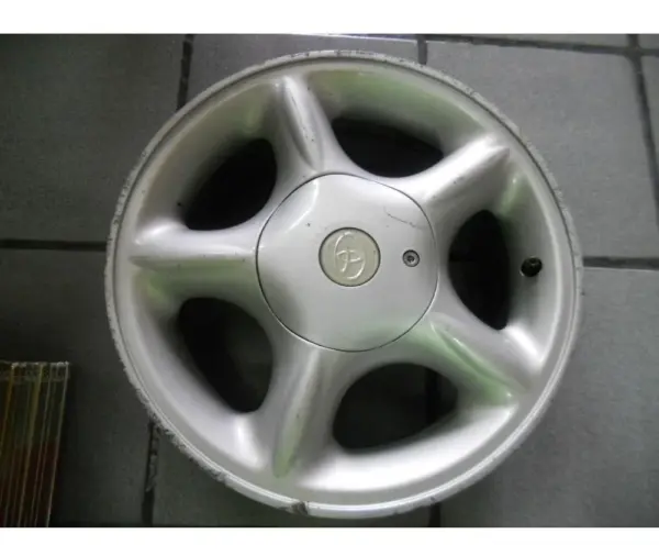 COROLA.webp CALOTA CENTRAL P/RODA ORIGINAL TOYOTA COROLA 99/00 - UNID.