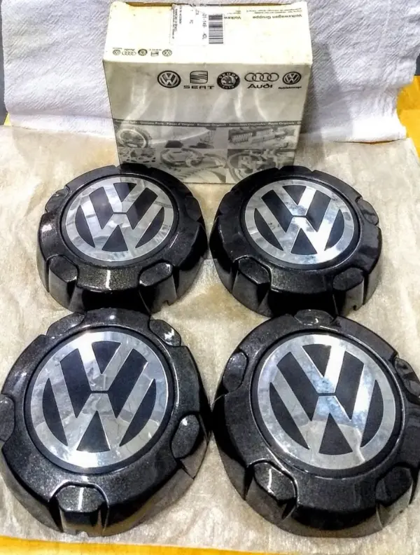 CALOTA CENTRAL P/RODA SAVEIRO TROOPER 4x100 Orig. VW - 1PÇ - (2320)