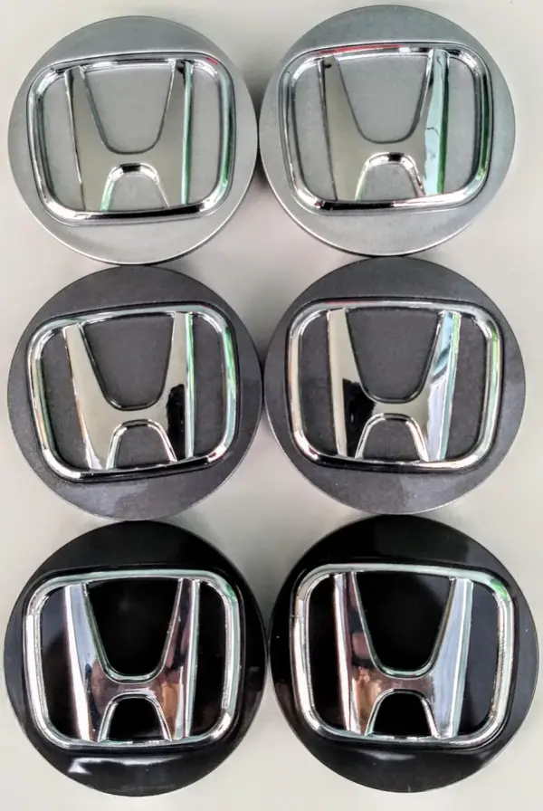 CALOTINHA CENTRAL P/RODA HONDA FIT/CITY C/LOGO CROMADO - 1PÇ - 002281-C